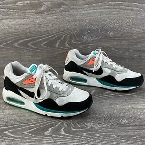 Nike Air Max Shoes in Black, White, and Teal with Orange Accents